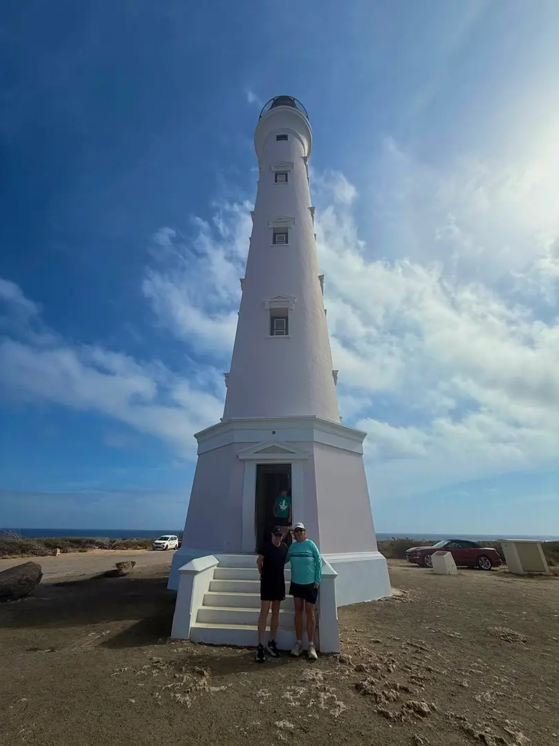 Couple at the base of the California Lighthouse